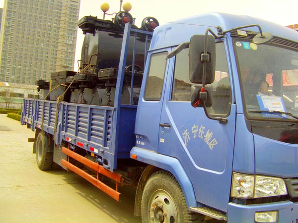 /中煤工矿集团生产的矿车运往郓城某矿/